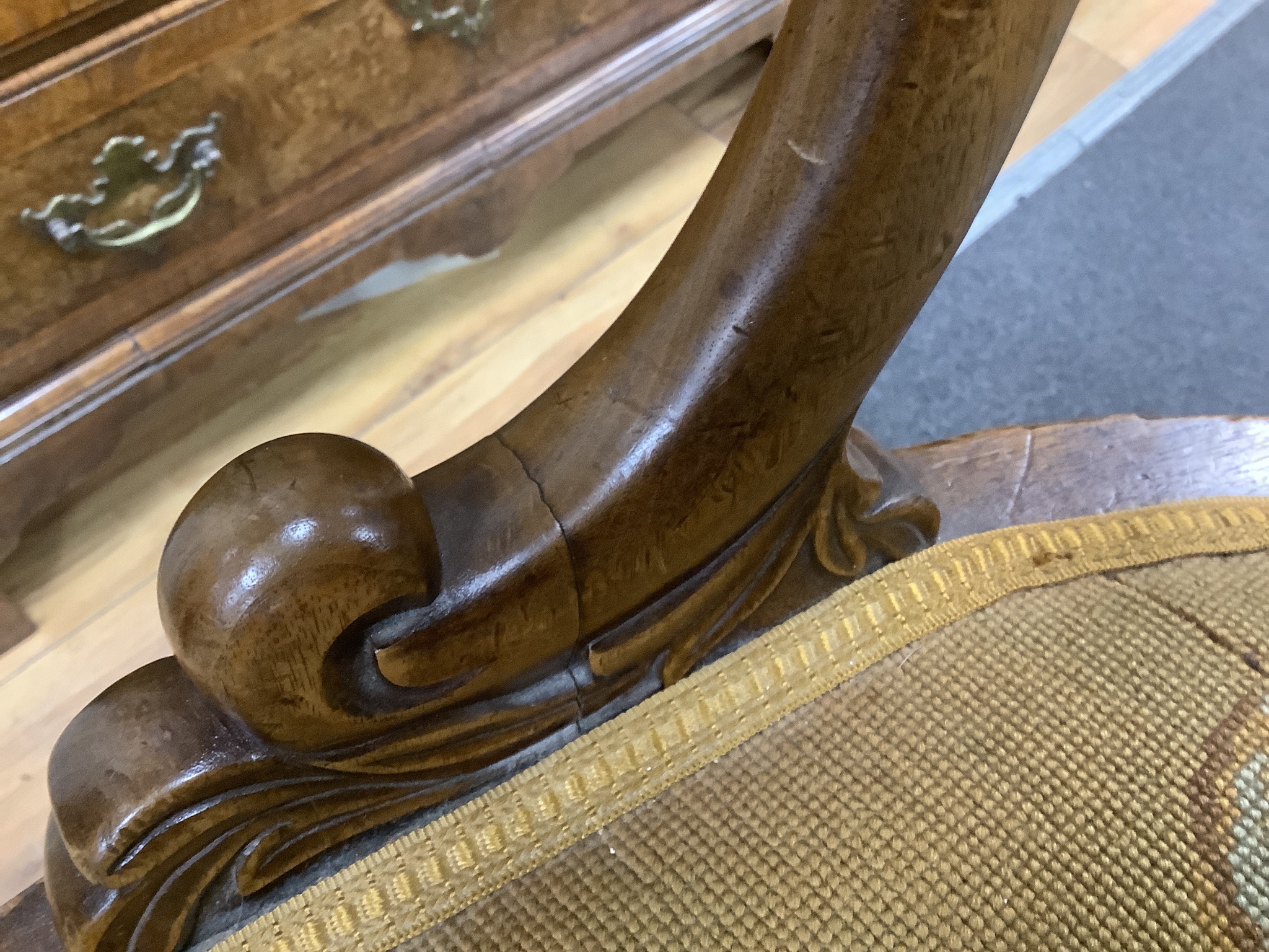 A Victorian carved walnut elbow chair, width 58cm, depth 48cm, height 90cm